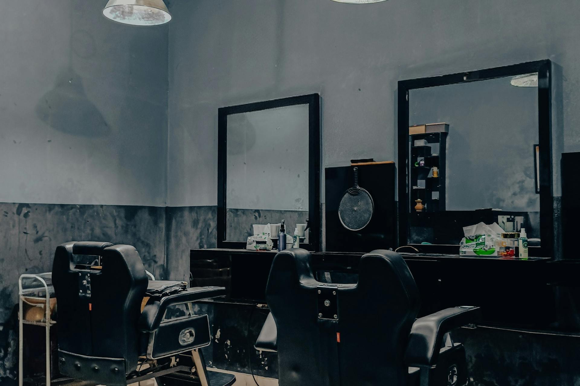 Mayfair-style barbershop interior at dusk