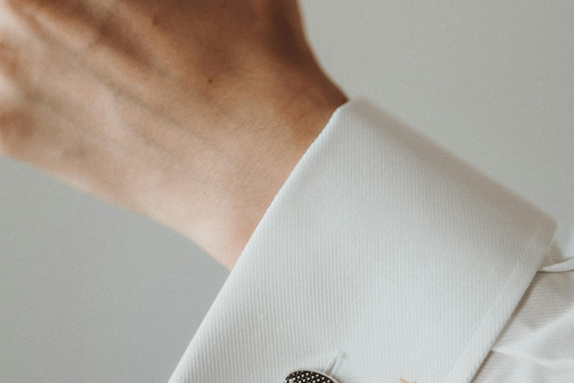 Tweed and cufflinks detail